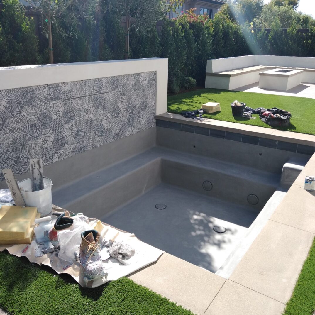 Need Just A Spa With Fire Pit, Bench, And BBQ Island? We Can Help5